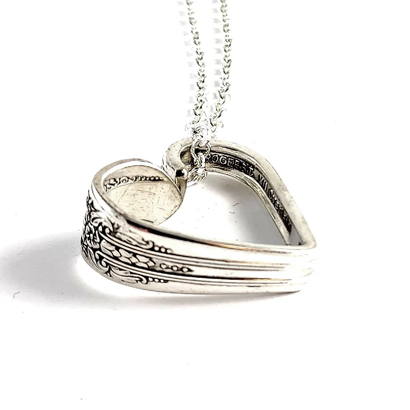 women link necklaces -International Reflection Floating Heart Spoon Necklace